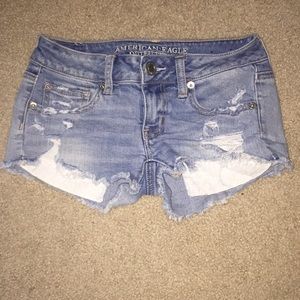 Double 0 American Eagle destroyed shorts.